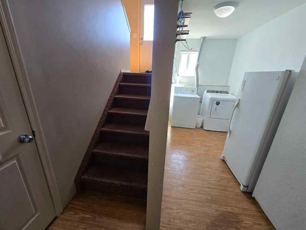 MLS® A2265659 - 7021 Deer Street  in College Heights Lacombe, Residential