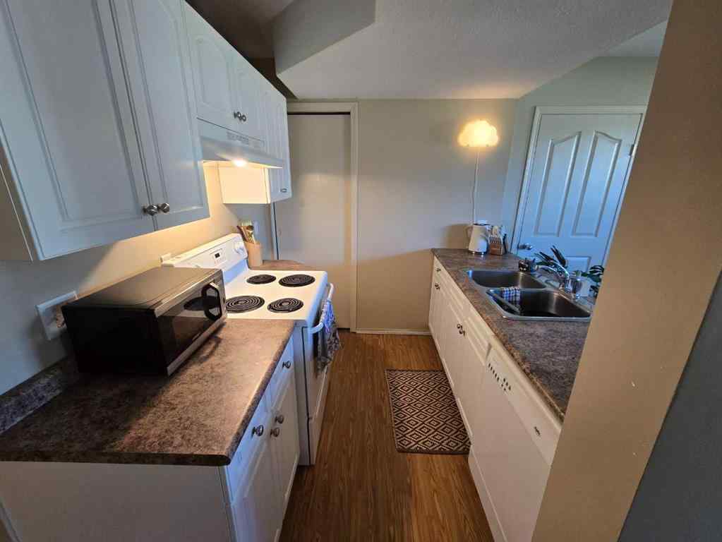 MLS® A2265659 - 7021 Deer Street  in College Heights Lacombe, Residential