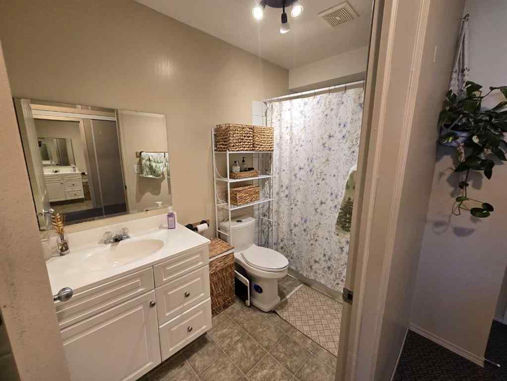 MLS® A2265659 - 7021 Deer Street  in College Heights Lacombe, Residential