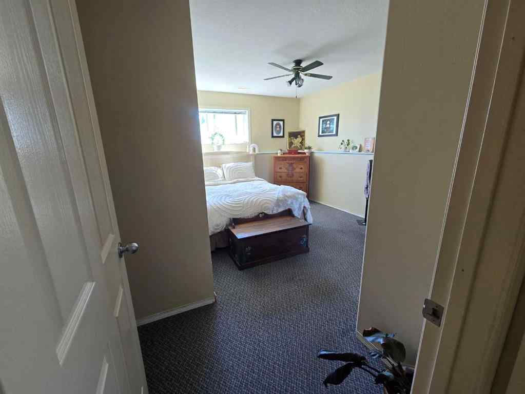 MLS® A2265659 - 7021 Deer Street  in College Heights Lacombe, Residential