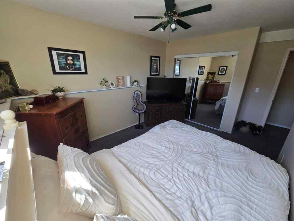 MLS® A2265659 - 7021 Deer Street  in College Heights Lacombe, Residential