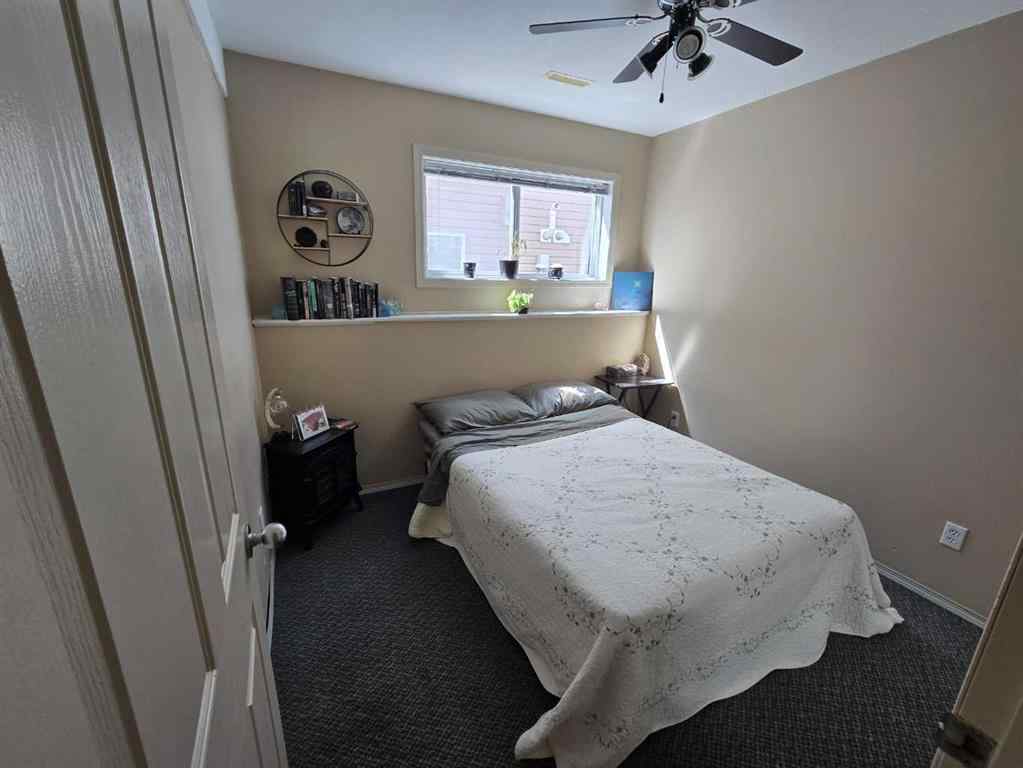 MLS® A2265659 - 7021 Deer Street  in College Heights Lacombe, Residential