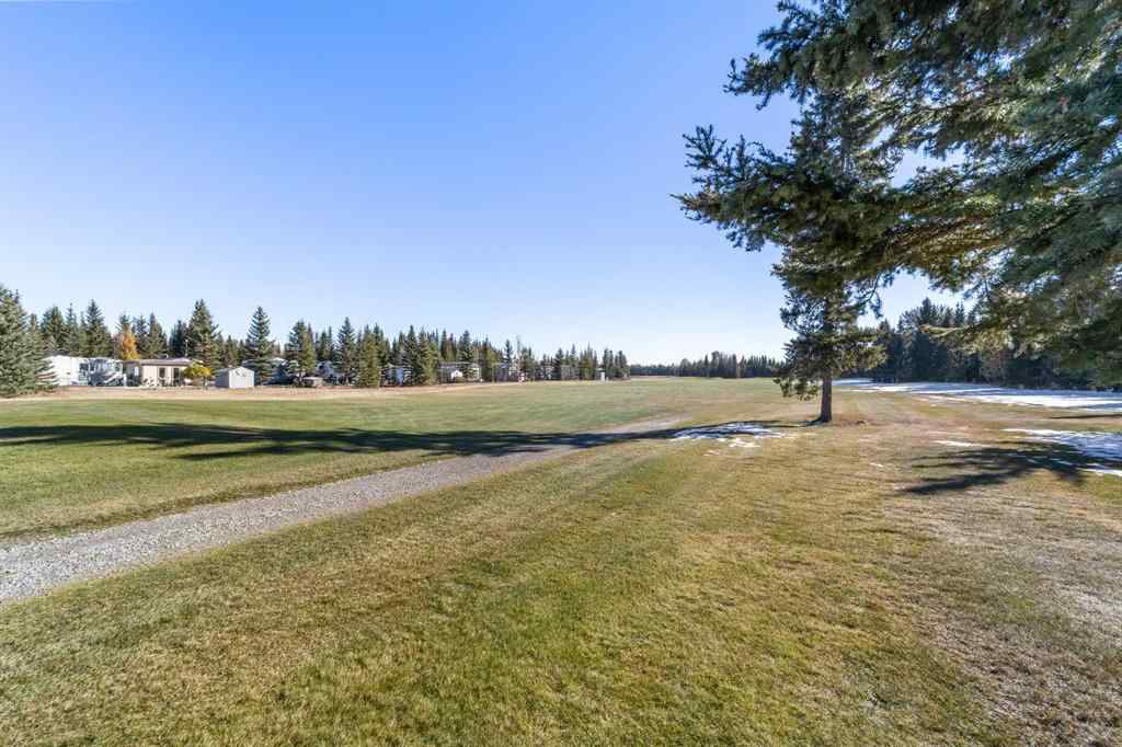 MLS® A2265688 - Unit #21 32379 Range Road 55   in Coyote Creek Rural Mountain View County, Residential