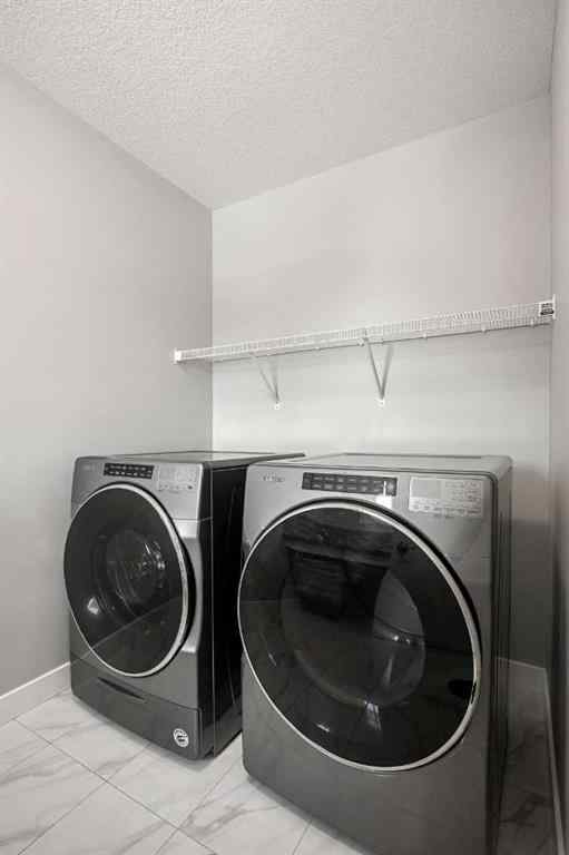 MLS® A2265729 - 212 Magnolia Heath SE in Mahogany Calgary, Residential