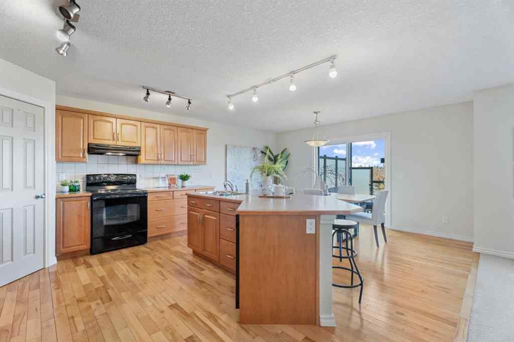 MLS® A2265734 - 35 Cimarron Park Green  in Cimarron Park Okotoks, Residential