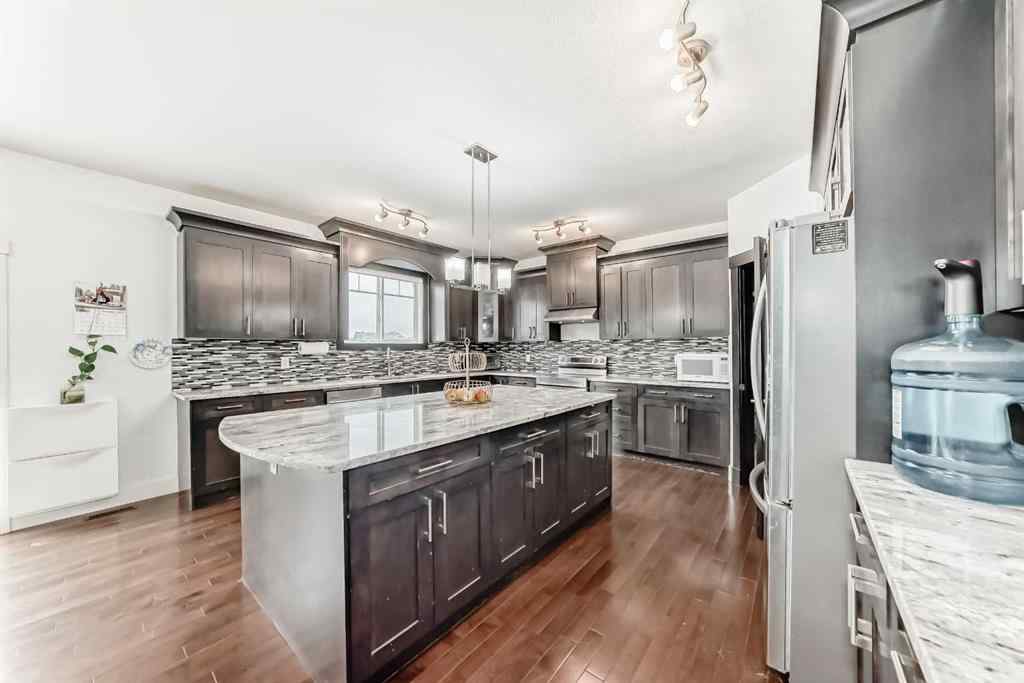 MLS® A2265735 - 388 Kinniburgh Boulevard  in Kinniburgh North Chestermere, Residential