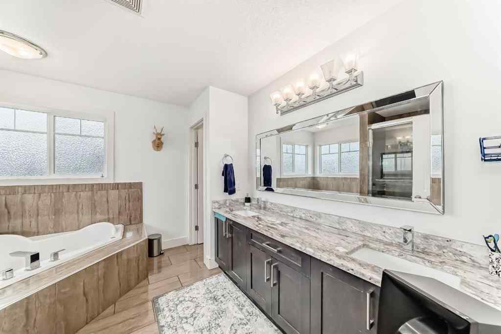 MLS® A2265735 - 388 Kinniburgh Boulevard  in Kinniburgh North Chestermere, Residential