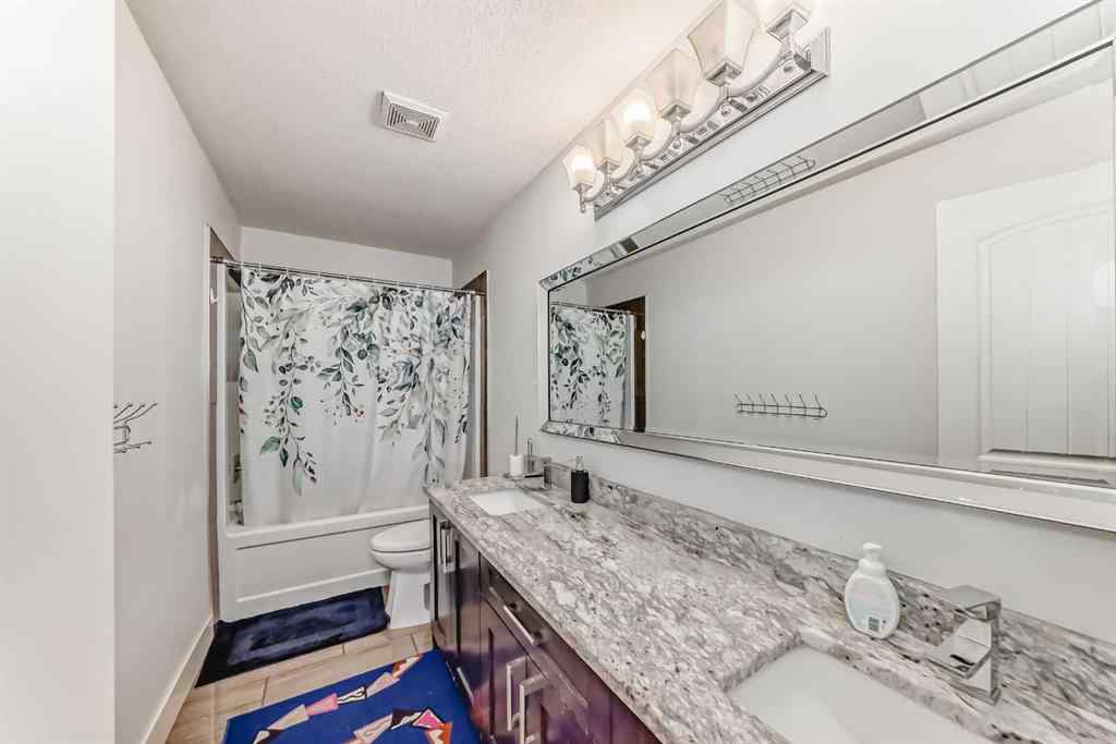 MLS® A2265735 - 388 Kinniburgh Boulevard  in Kinniburgh North Chestermere, Residential
