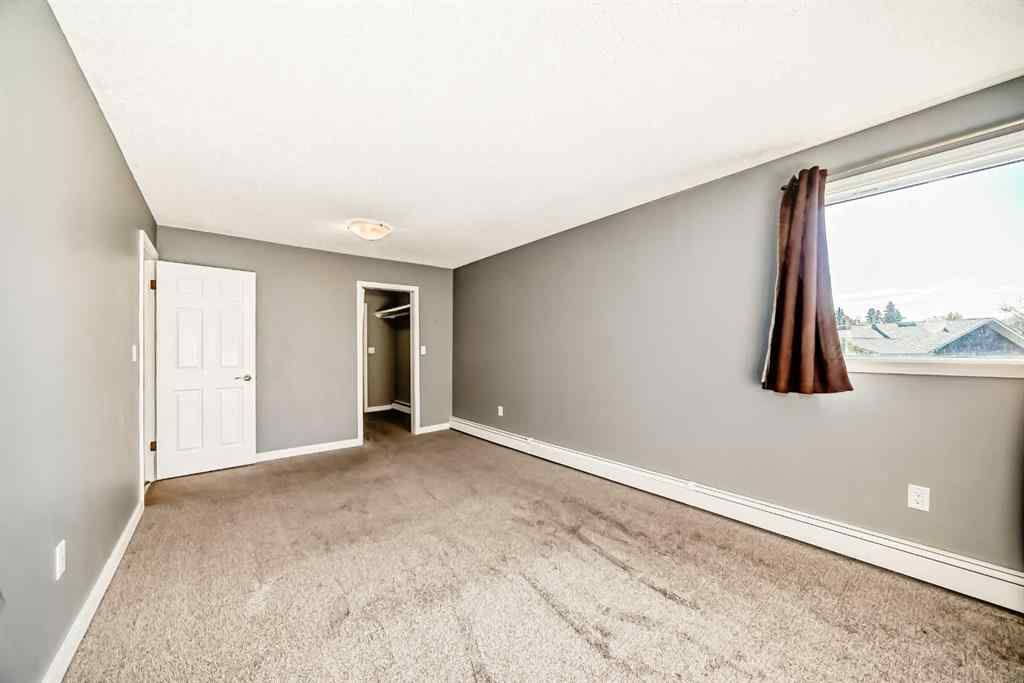 MLS® A2265746 - Unit #210 1001 68 Avenue SW in Kelvin Grove Calgary, Residential