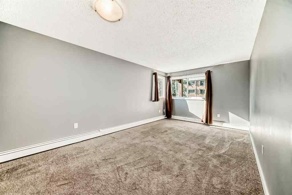 MLS® A2265746 - Unit #210 1001 68 Avenue SW in Kelvin Grove Calgary, Residential