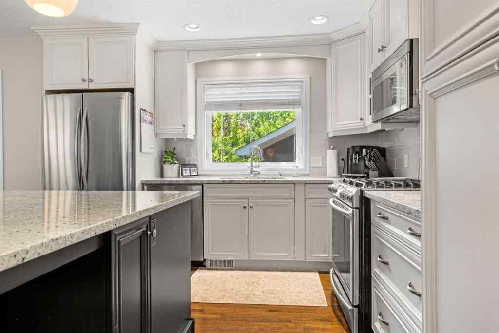 MLS® A2265747 - 8027 Churchill Drive SW in Chinook Park Calgary, Residential