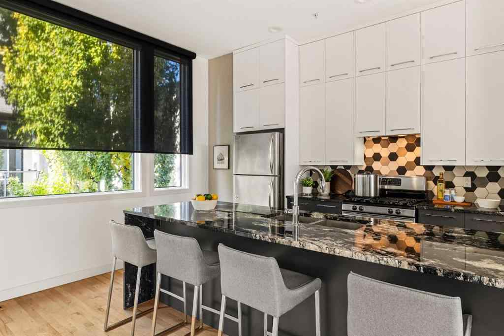 MLS® A2265775 - Unit #105 1720 12 Street SW in Lower Mount Royal Calgary, Residential