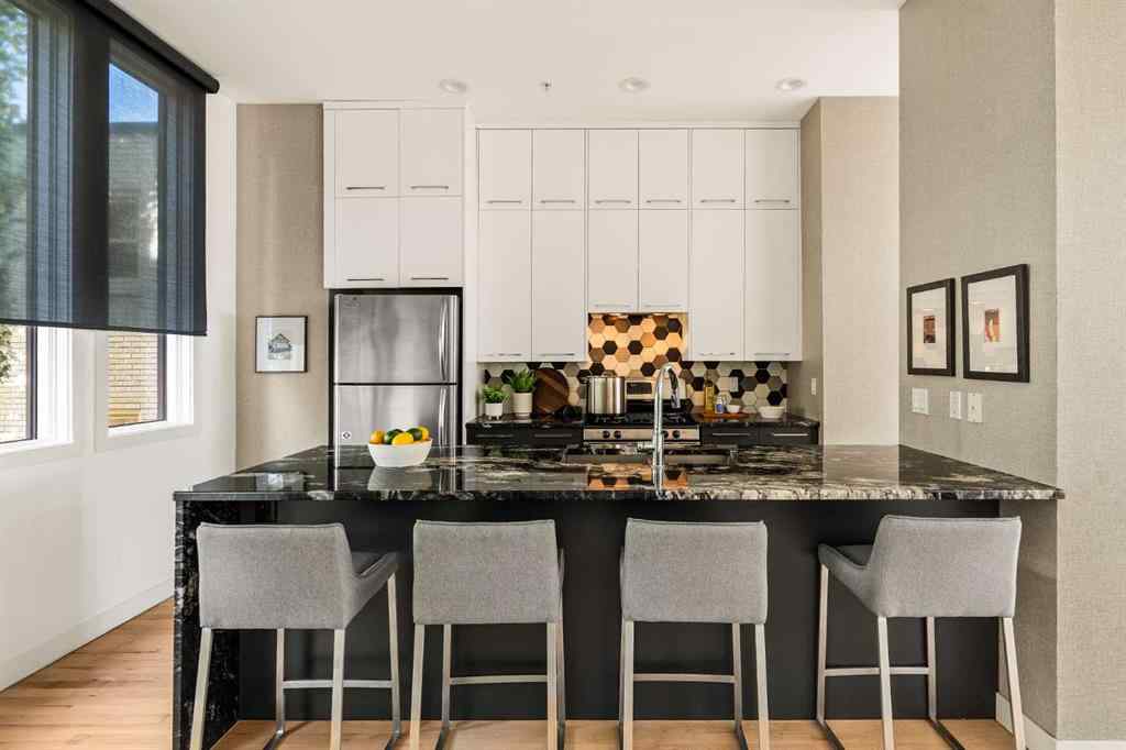 MLS® A2265775 - Unit #105 1720 12 Street SW in Lower Mount Royal Calgary, Residential