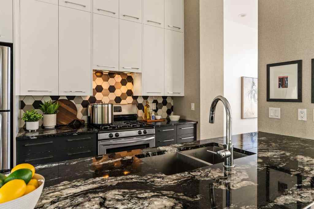 MLS® A2265775 - Unit #105 1720 12 Street SW in Lower Mount Royal Calgary, Residential