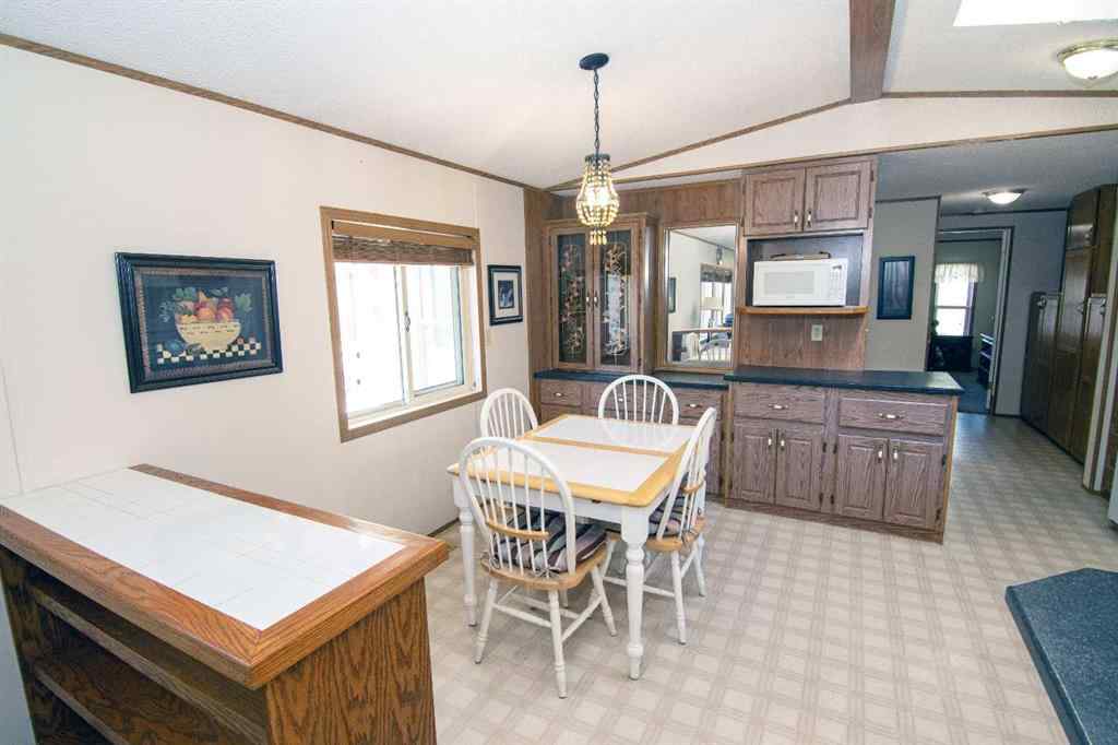 MLS® A2265791 - 504 Home Place  SE in Southeast Central High River High River, Mobile