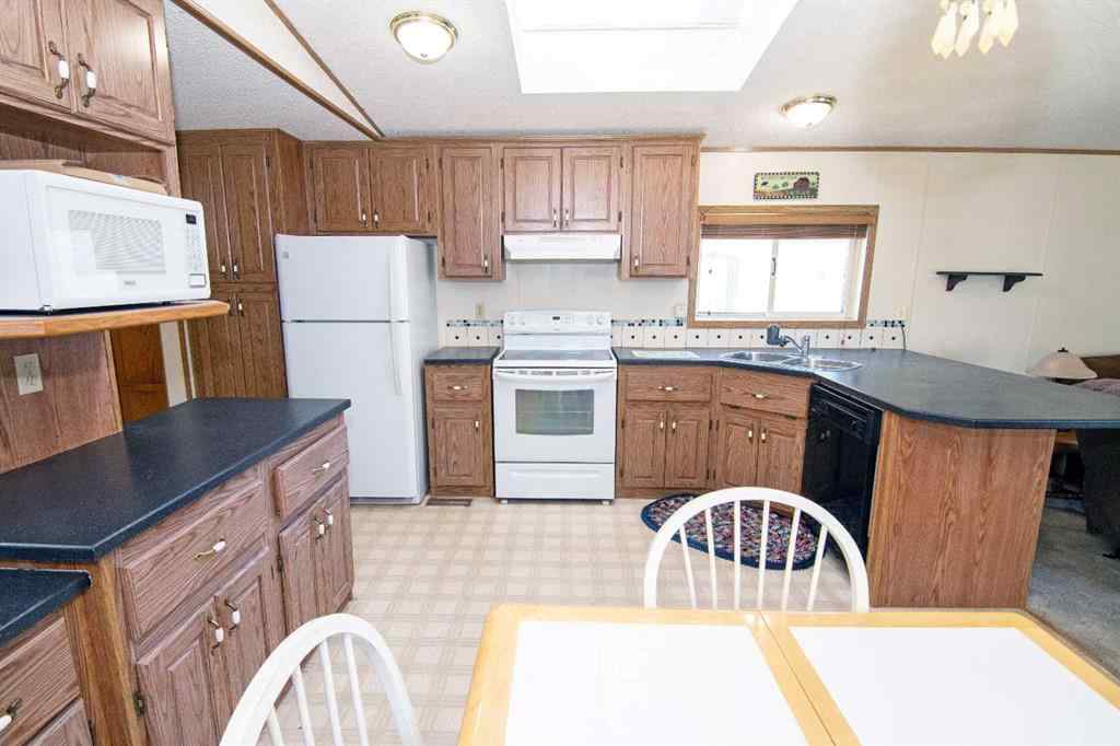 MLS® A2265791 - 504 Home Place  SE in Southeast Central High River High River, Mobile