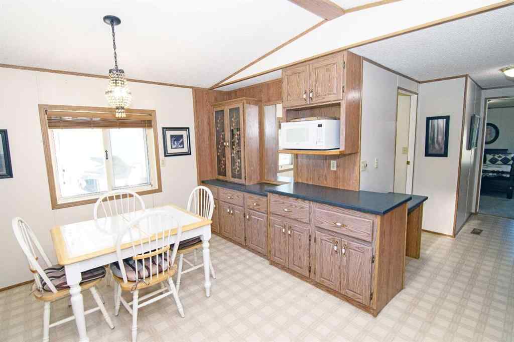 MLS® A2265791 - 504 Home Place  SE in Southeast Central High River High River, Mobile