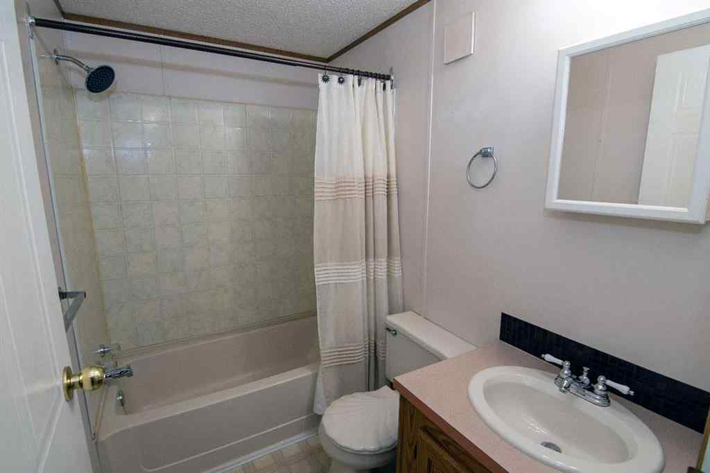 MLS® A2265791 - 504 Home Place  SE in Southeast Central High River High River, Mobile