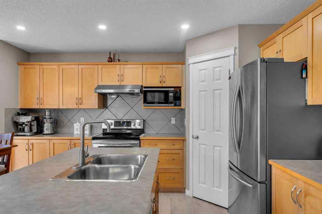 MLS® A2265795 - 138 Saddlecrest Park NE in Saddle Ridge Calgary, Residential