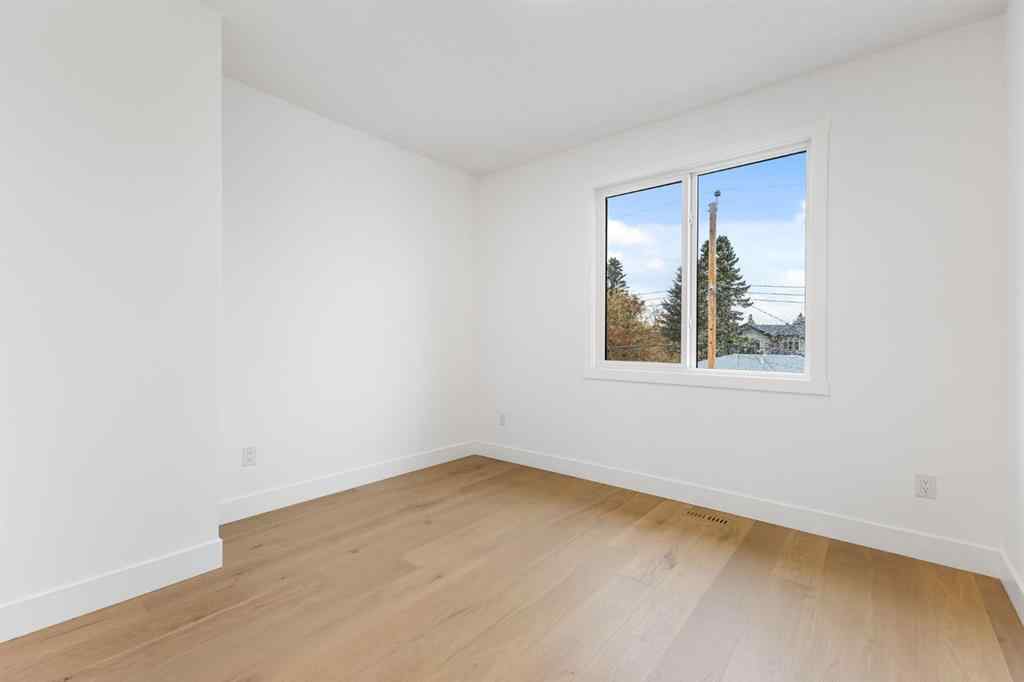 MLS® A2265798 - 4418 8 Avenue SW in Rosscarrock Calgary, Residential