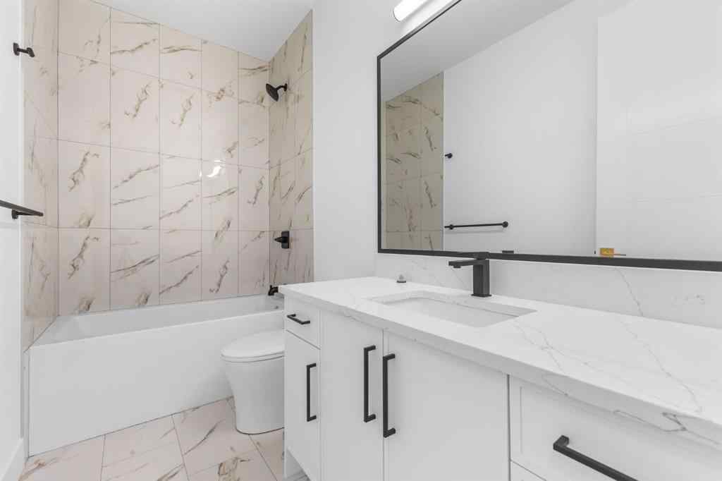 MLS® A2265798 - 4418 8 Avenue SW in Rosscarrock Calgary, Residential