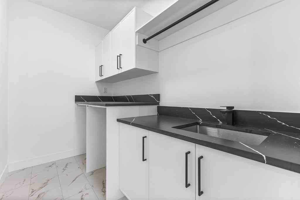 MLS® A2265798 - 4418 8 Avenue SW in Rosscarrock Calgary, Residential