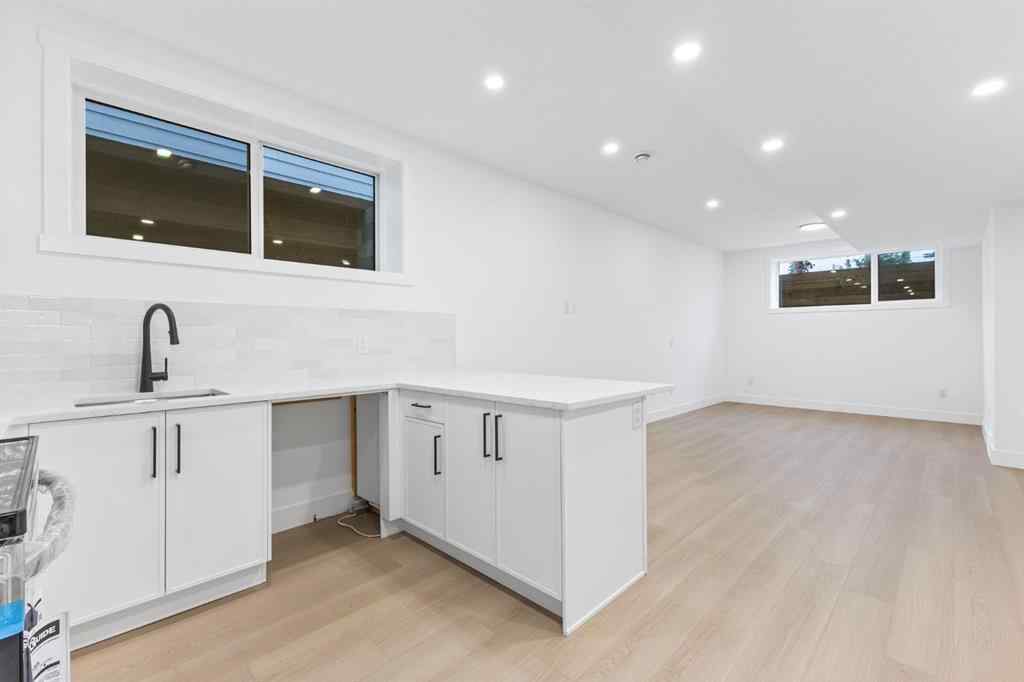 MLS® A2265798 - 4418 8 Avenue SW in Rosscarrock Calgary, Residential