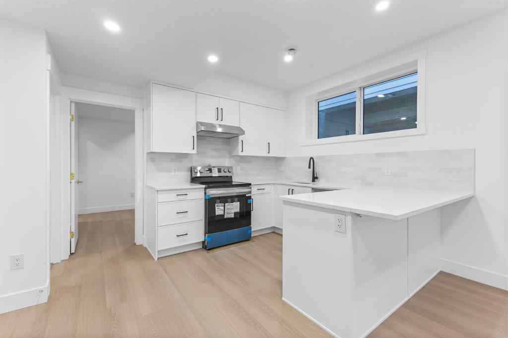 MLS® A2265798 - 4418 8 Avenue SW in Rosscarrock Calgary, Residential