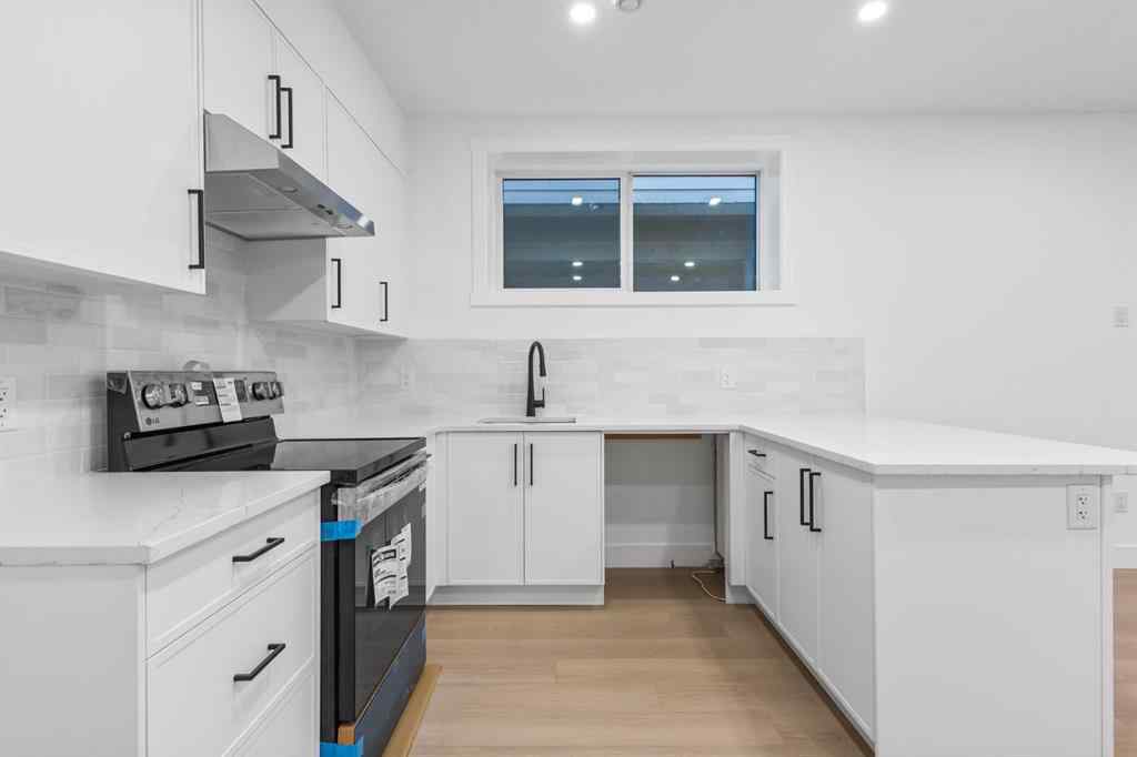 MLS® A2265798 - 4418 8 Avenue SW in Rosscarrock Calgary, Residential