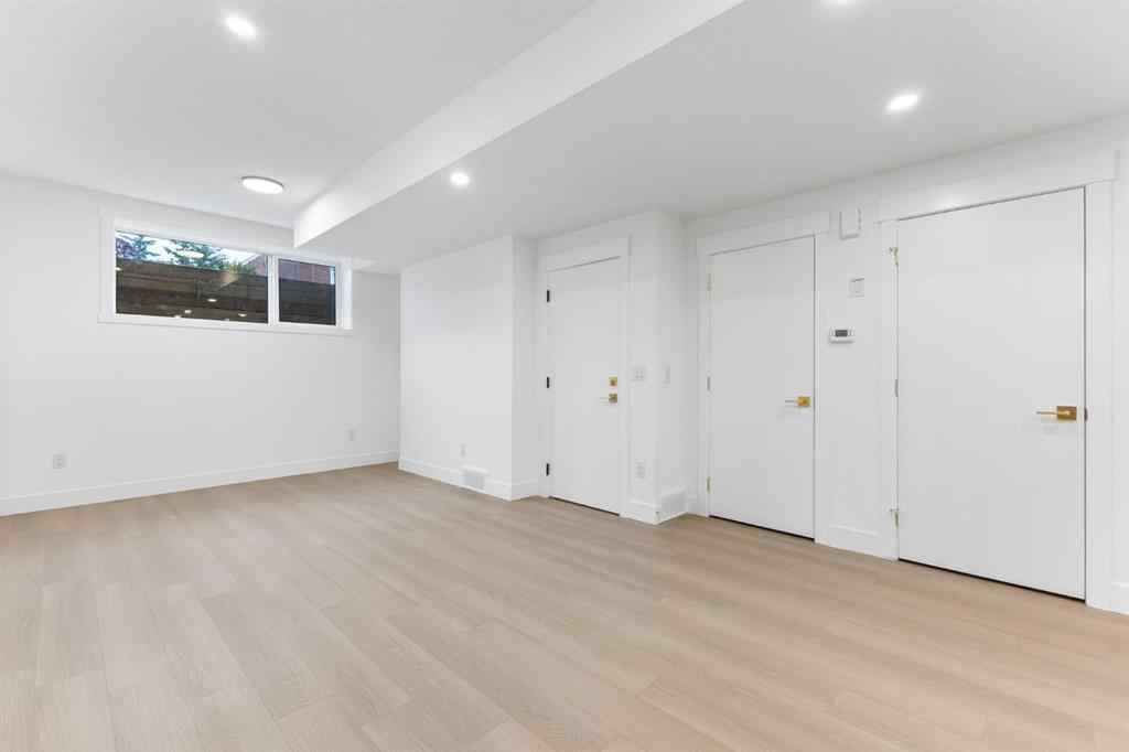 MLS® A2265798 - 4418 8 Avenue SW in Rosscarrock Calgary, Residential