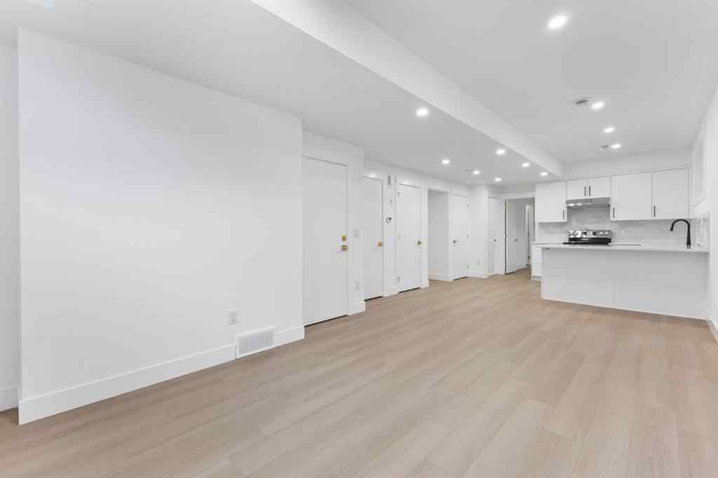 MLS® A2265798 - 4418 8 Avenue SW in Rosscarrock Calgary, Residential