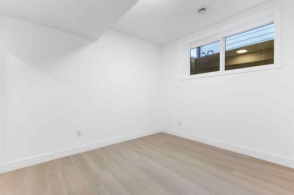 MLS® A2265798 - 4418 8 Avenue SW in Rosscarrock Calgary, Residential