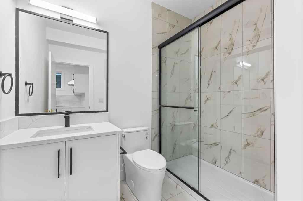 MLS® A2265798 - 4418 8 Avenue SW in Rosscarrock Calgary, Residential