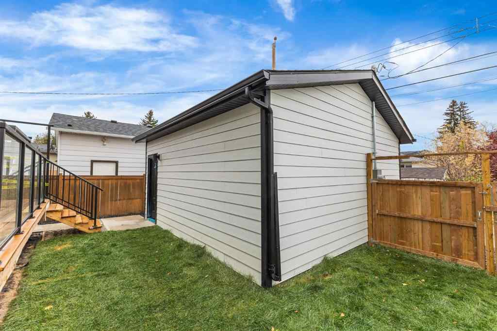 MLS® A2265798 - 4418 8 Avenue SW in Rosscarrock Calgary, Residential