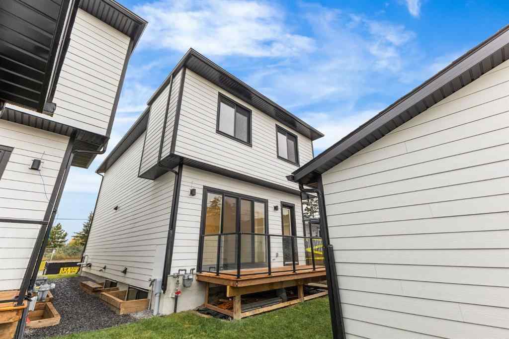 MLS® A2265798 - 4418 8 Avenue SW in Rosscarrock Calgary, Residential