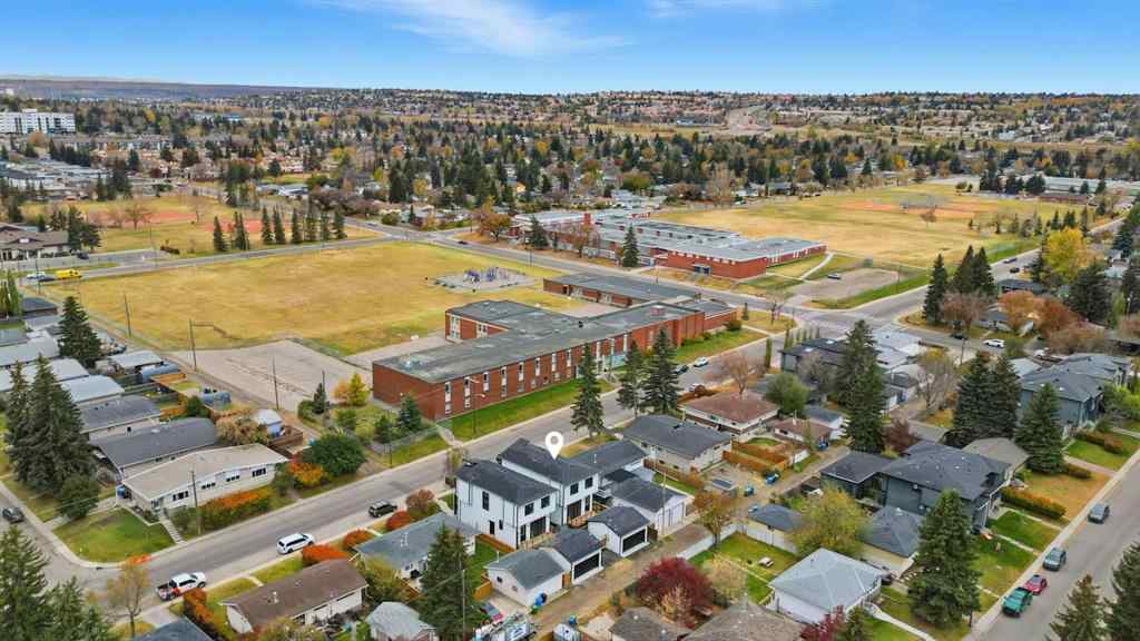 MLS® A2265798 - 4418 8 Avenue SW in Rosscarrock Calgary, Residential