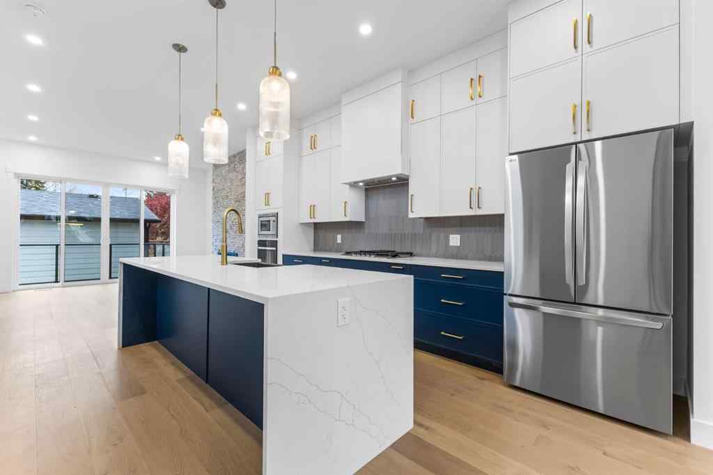 MLS® A2265798 - 4418 8 Avenue SW in Rosscarrock Calgary, Residential