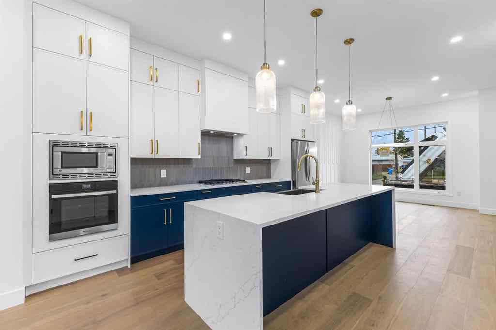 MLS® A2265798 - 4418 8 Avenue SW in Rosscarrock Calgary, Residential