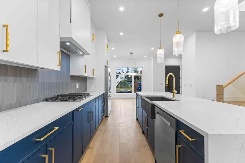 MLS® A2265798 - 4418 8 Avenue SW in Rosscarrock Calgary, Residential