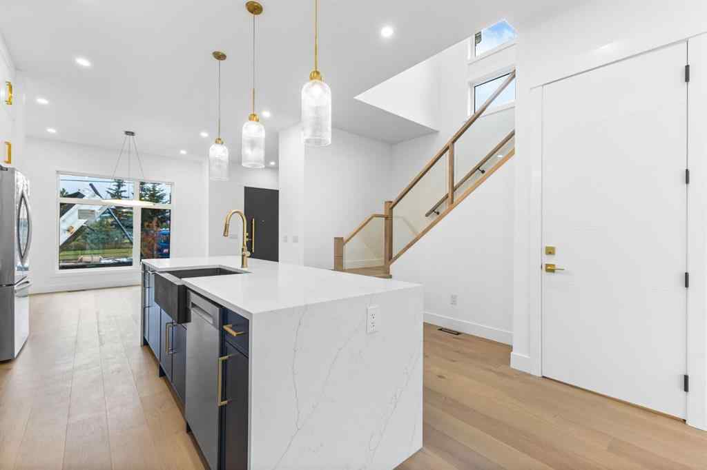 MLS® A2265798 - 4418 8 Avenue SW in Rosscarrock Calgary, Residential