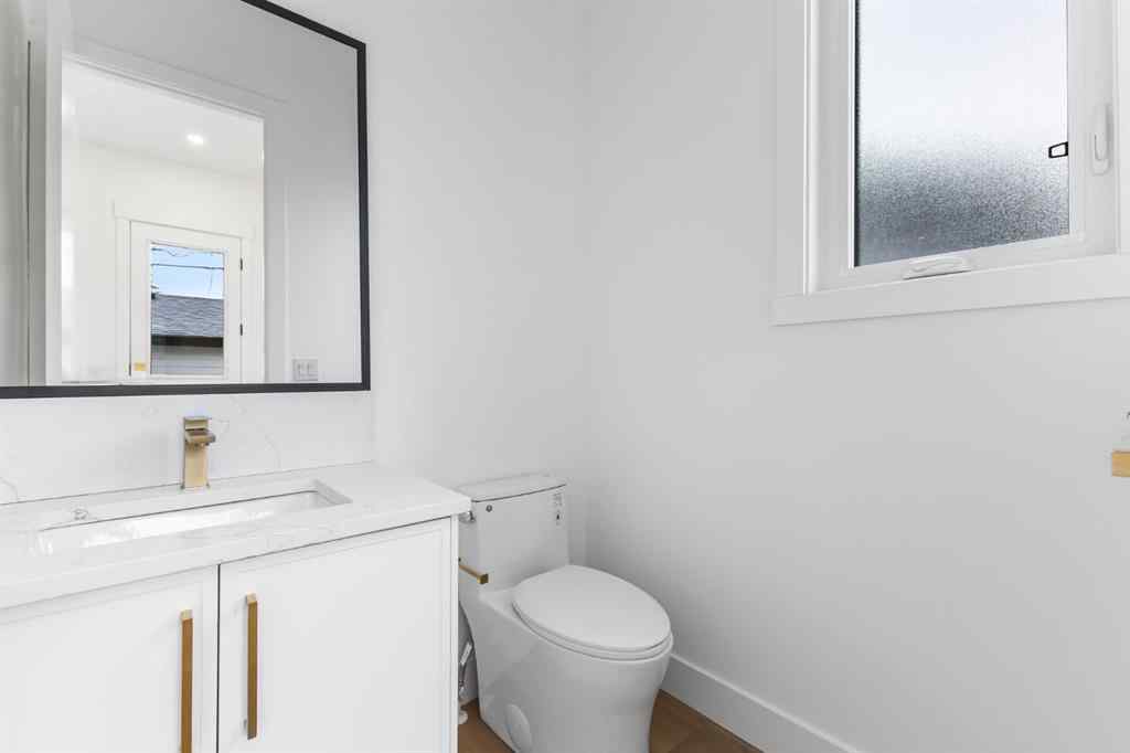 MLS® A2265798 - 4418 8 Avenue SW in Rosscarrock Calgary, Residential