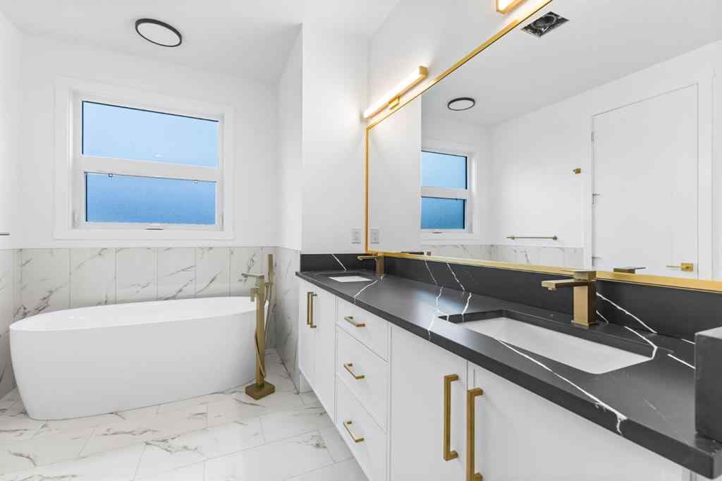 MLS® A2265798 - 4418 8 Avenue SW in Rosscarrock Calgary, Residential