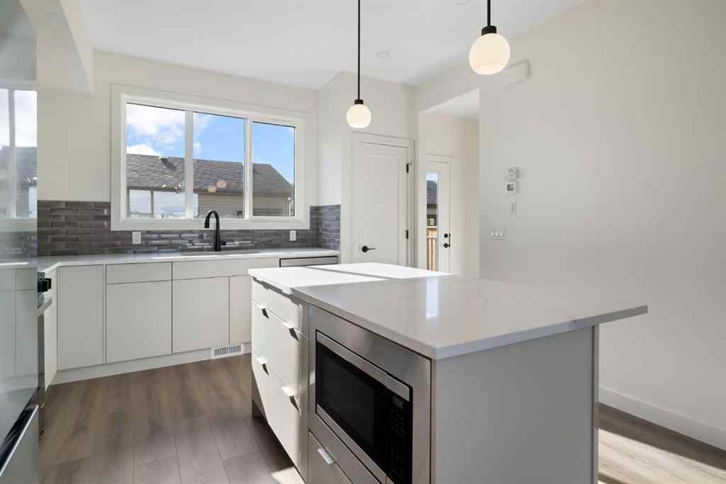 MLS® A2265805 - 215 Belvedere Avenue SE in Belvedere Calgary, Residential