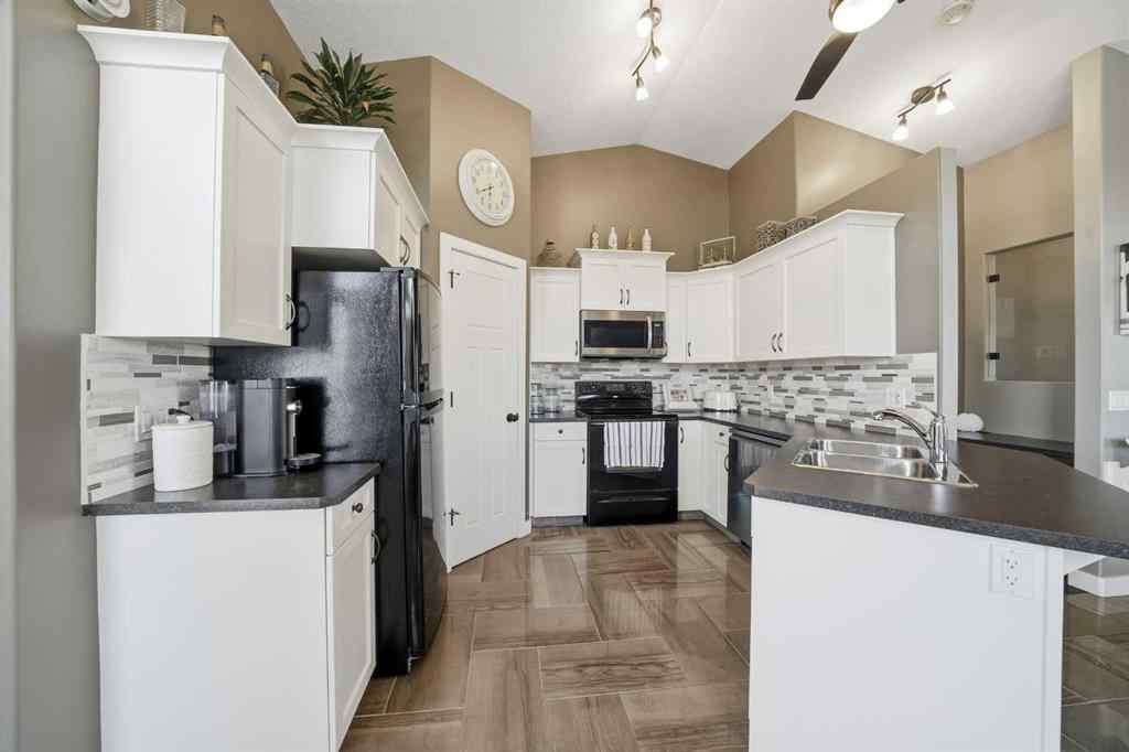 MLS® A2265824 - 199 Robinson Avenue  in Park Place Penhold, Residential