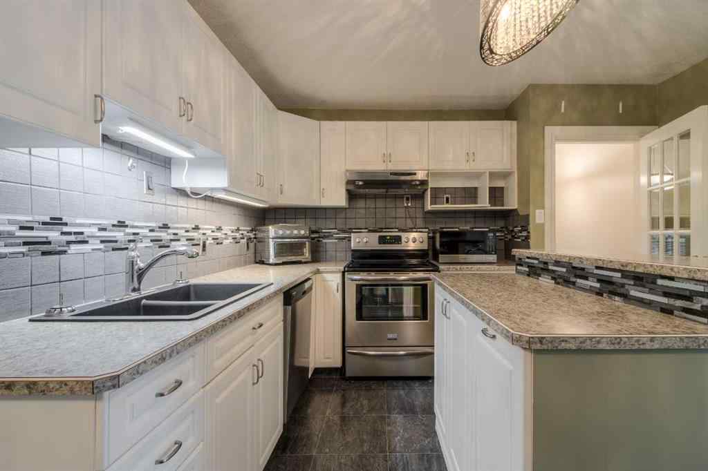 MLS® A2265829 - 813 Stafford Drive N in Senator Buchanan Lethbridge, Residential