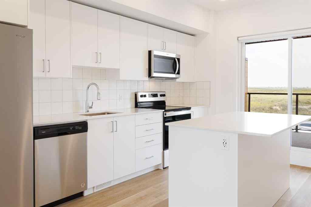 MLS® A2265835 - Unit #409 8535 19 Avenue SE in Belvedere Calgary, Residential