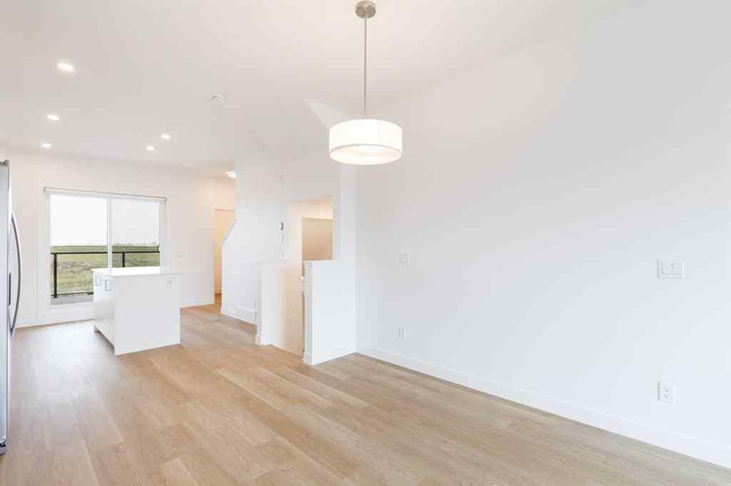 MLS® A2265835 - Unit #409 8535 19 Avenue SE in Belvedere Calgary, Residential