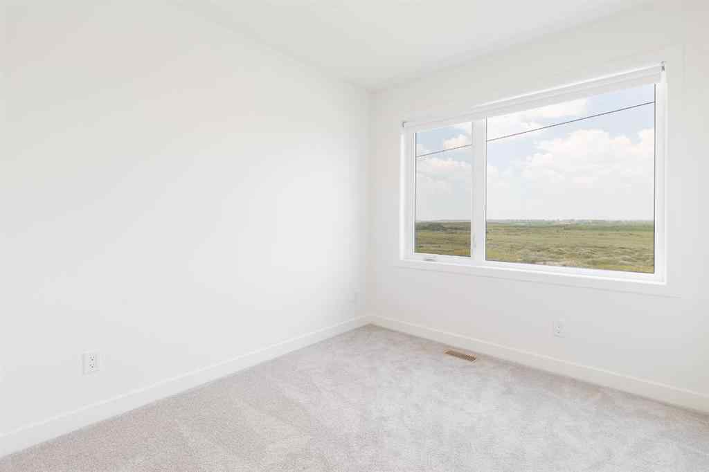 MLS® A2265835 - Unit #409 8535 19 Avenue SE in Belvedere Calgary, Residential