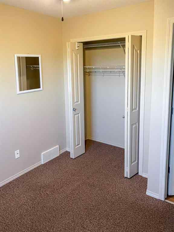 MLS® A2265842 - 7023 Deer Street  in College Heights Lacombe, Residential