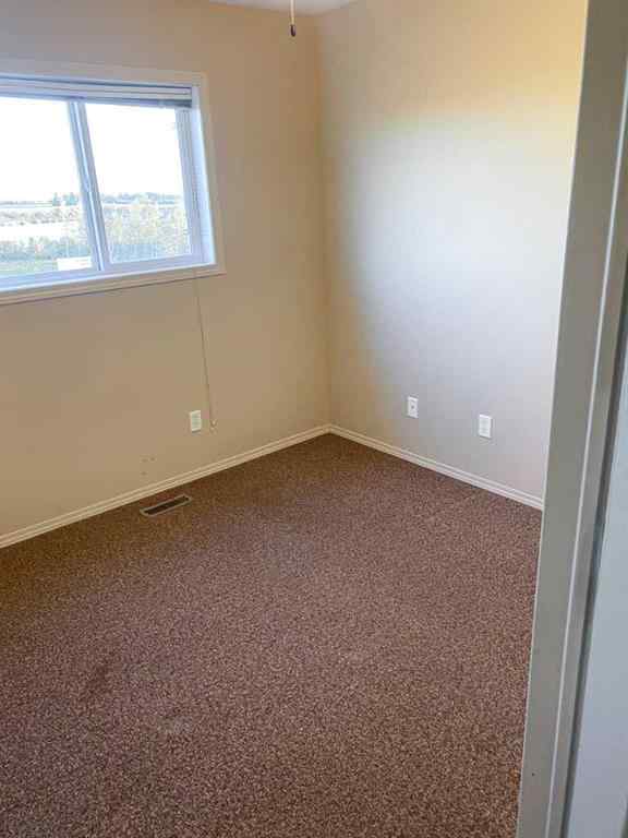 MLS® A2265842 - 7023 Deer Street  in College Heights Lacombe, Residential